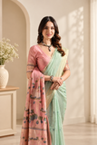 Elegant cotton saree featuring delicate floral motifs, woven border detailing, and a beautifully designed pallu with traditional tassel accents